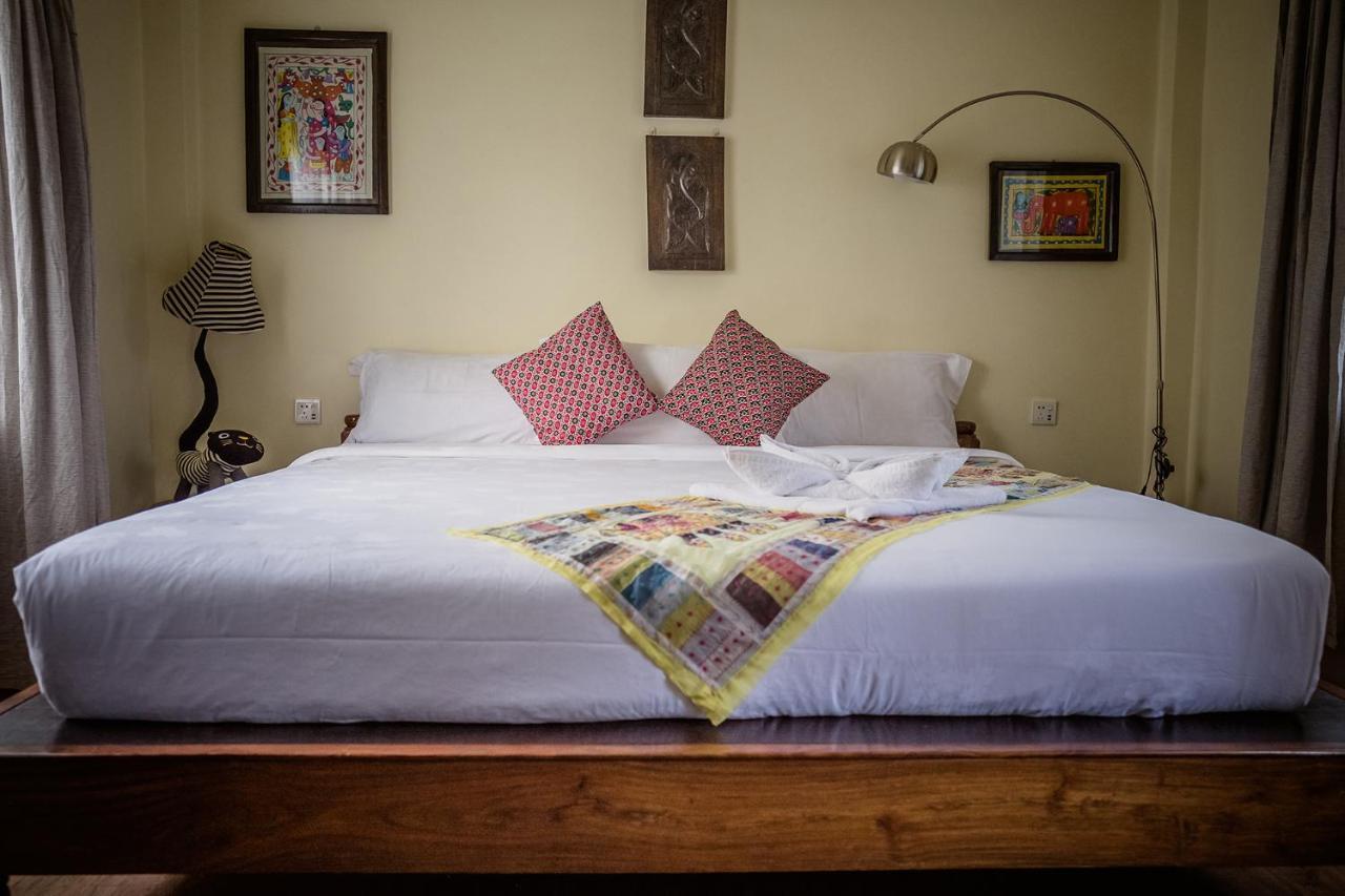 Mingtang Garden Cottage 名堂花园度假屋 Pokhara Exteriör bild